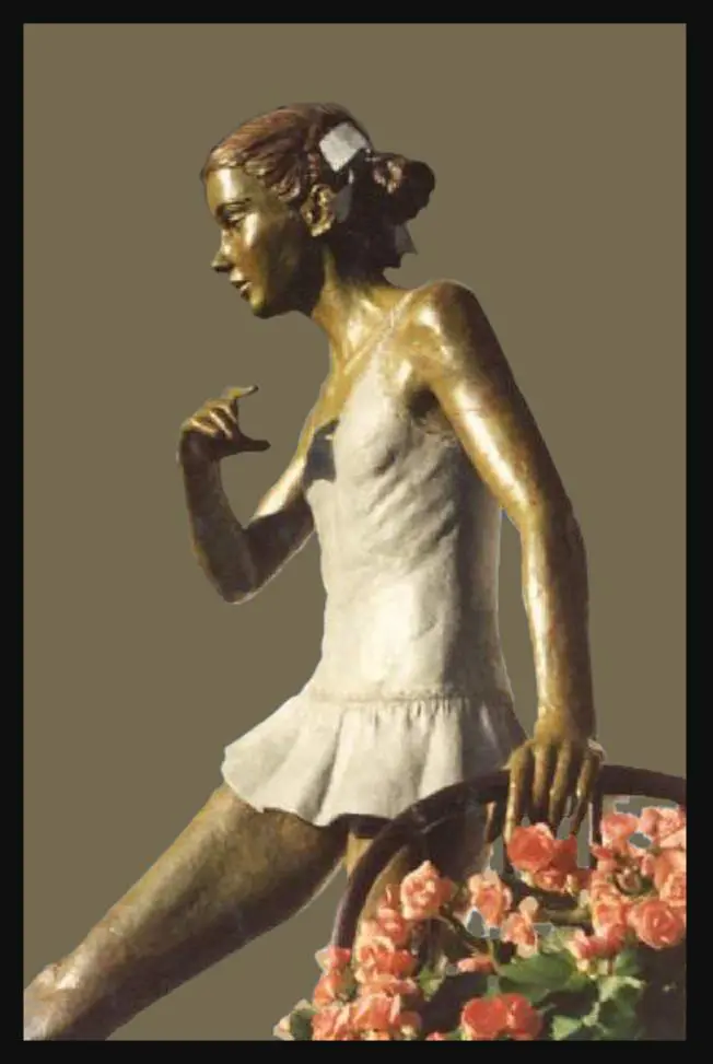A statue of a woman in white dress holding flowers.