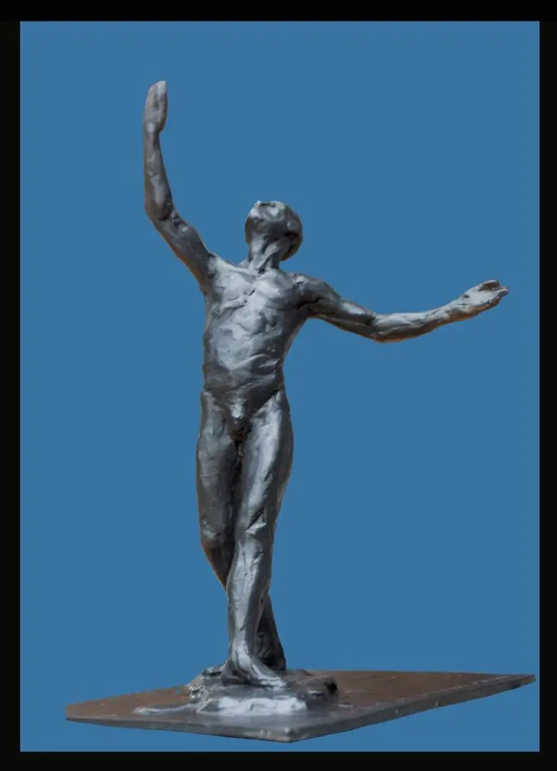 A statue of a man with his arms outstretched.